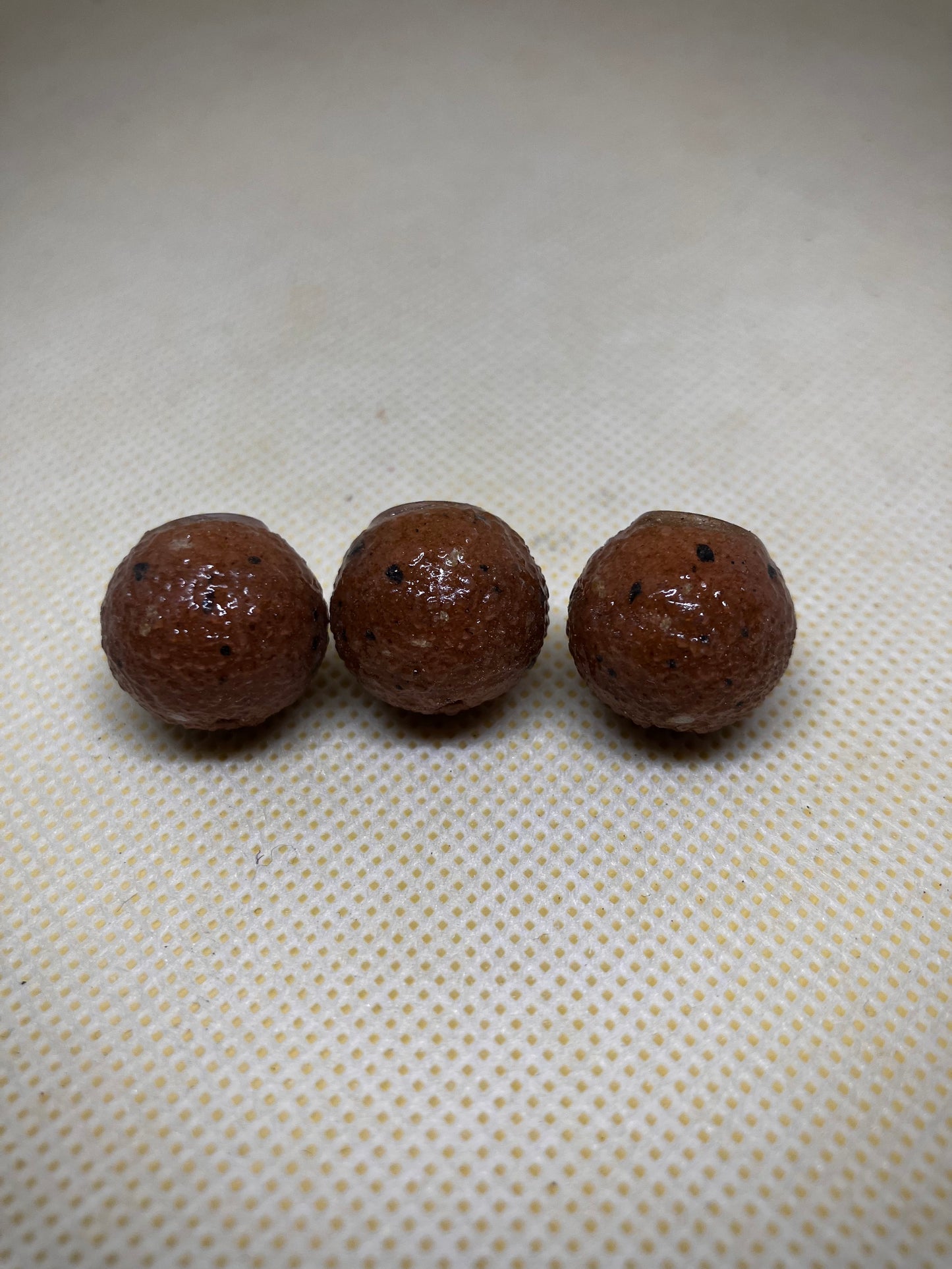 3x Brown/Red fishmeal type with hook ring swivel( good match for baitworks Atlantic heat)