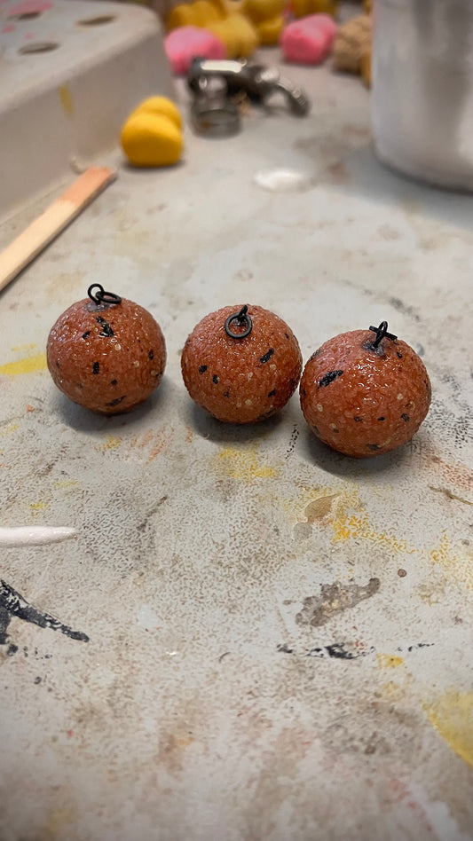 3x Brown/Red fishmeal type with hook ring swivel( good match for baitworks Atlantic heat)