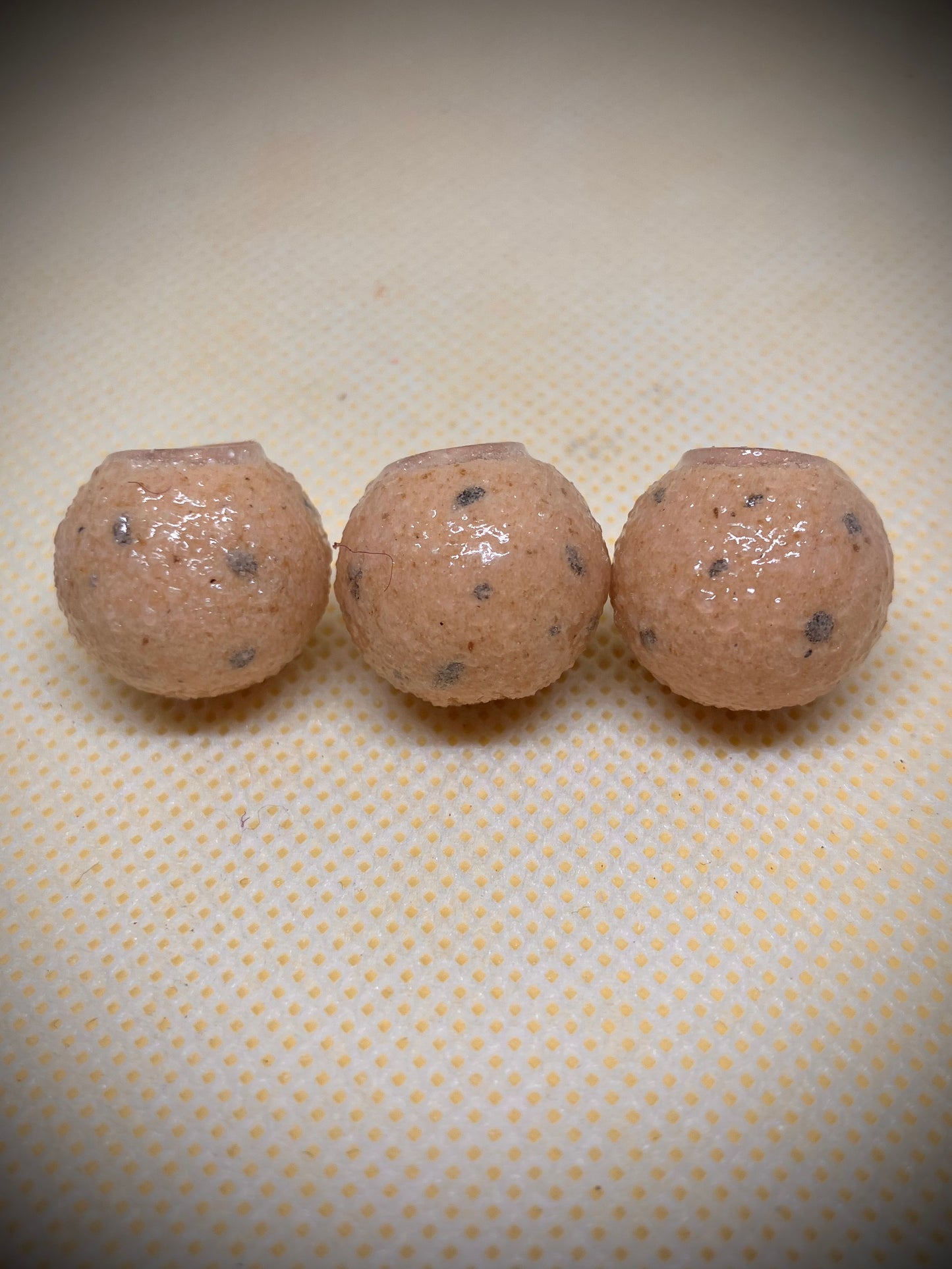 3x  washed out nut type boilies, with hook ring swivel